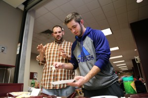 Sophomore Nick Yoder  and new RD Brent talks about the pizza that they are making. 