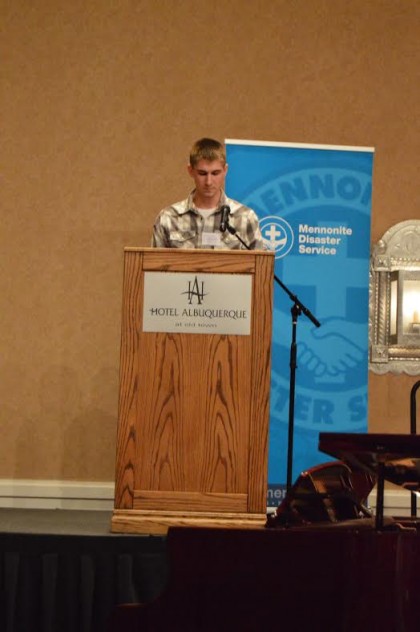 Sophomore Lane Schrock addressing the audience at the Mennonite Disaster Service Annual Meeting. Photo by 
