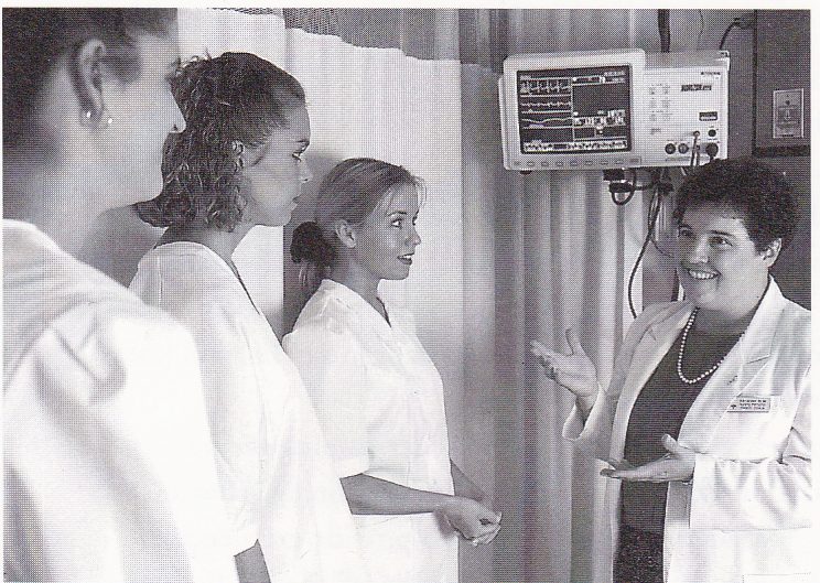 Ruby Graber instructs student nurses in the clinical setting. Photo courtesy of the Hesston College Nursing Department. 